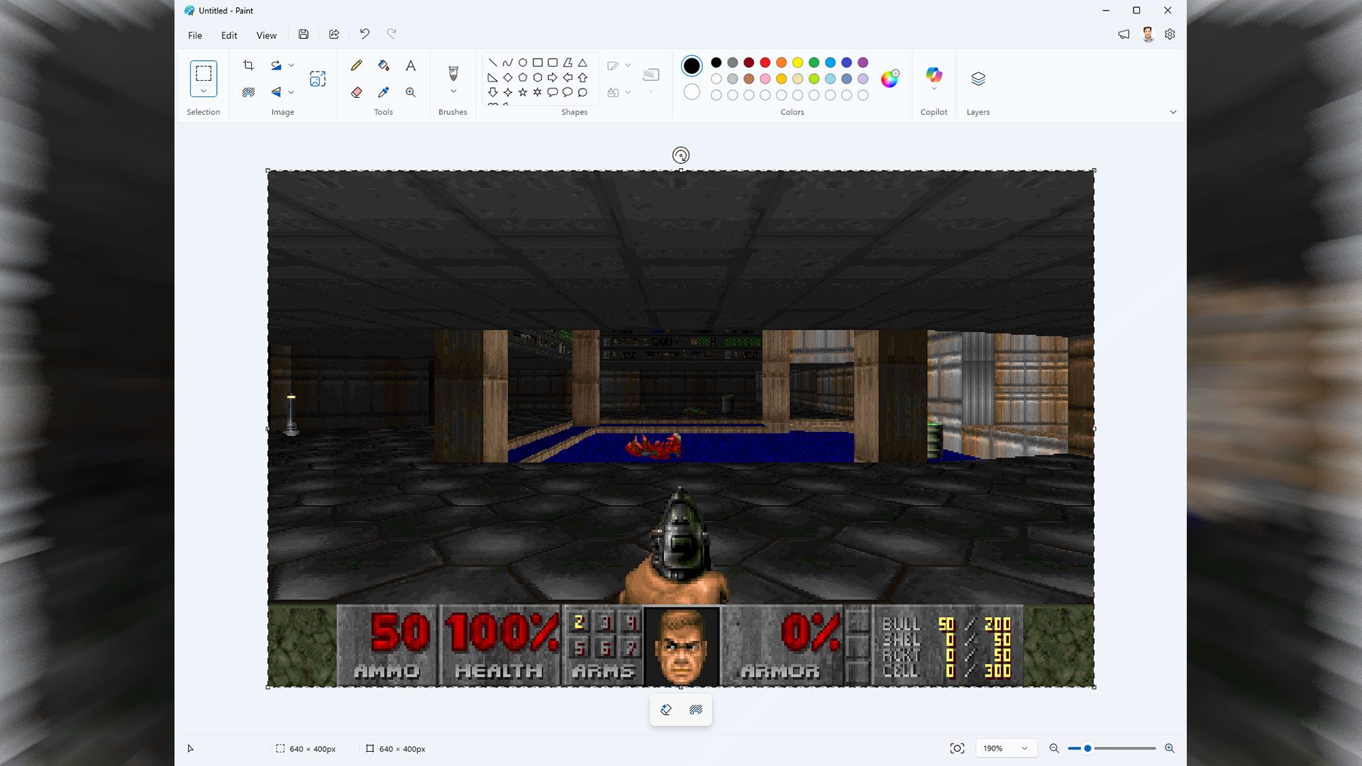 نمای پشت دوربین Canon EOS 550D در حال اجرای Doom